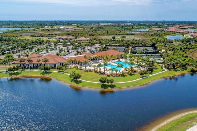 birds eye view of property with a water view