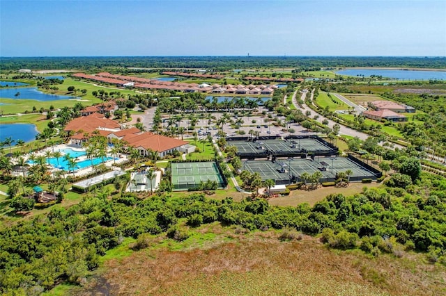 bird's eye view with a water view