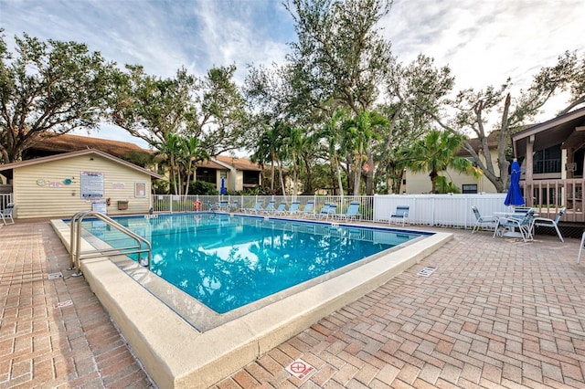 view of swimming pool featuring a patio