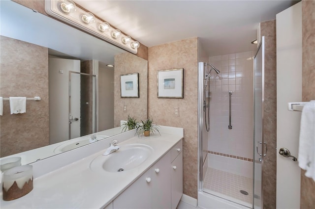 bathroom with vanity and walk in shower