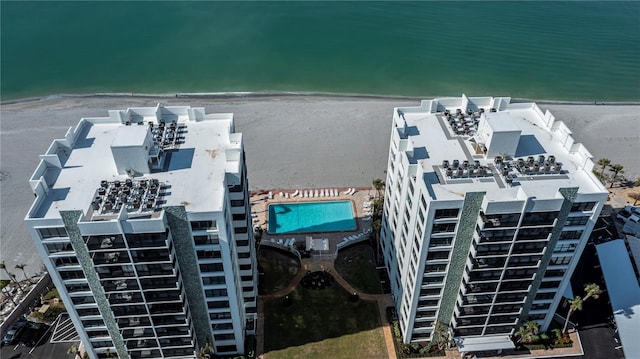 aerial view featuring a water view and a view of the beach