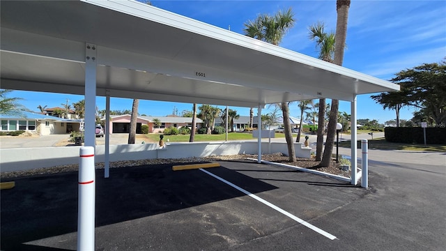 view of car parking featuring a carport