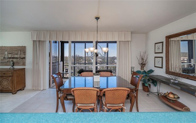 627 Alhambra Rd Unit 601, Venice, FL 34285 - dining room with a chandelier and tile patterned flooring