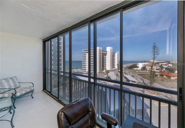 627 Alhambra Rd Unit 601, Venice, FL 34285 - sunroom featuring a water view