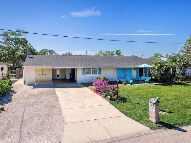 ranch-style house featuring a front yard