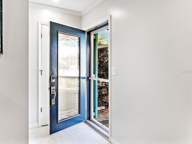 doorway featuring ornamental molding