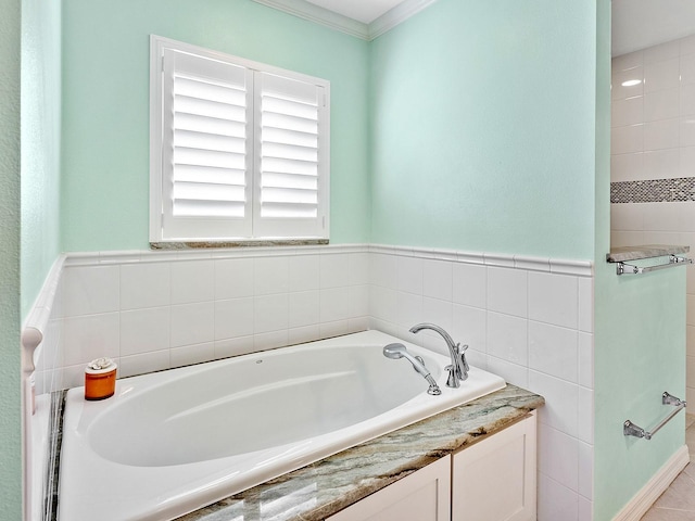 bathroom with a relaxing tiled tub, ornamental molding, and tile walls