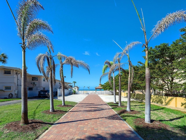 view of home's community featuring a yard