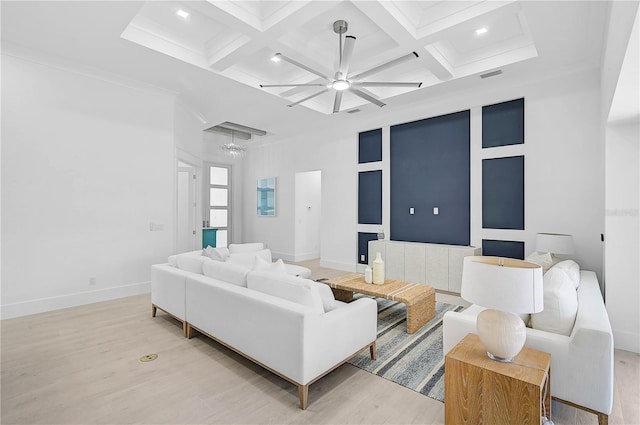 living room featuring beamed ceiling, coffered ceiling, and light wood-type flooring