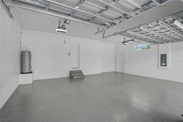 garage with a garage door opener, electric panel, and water heater