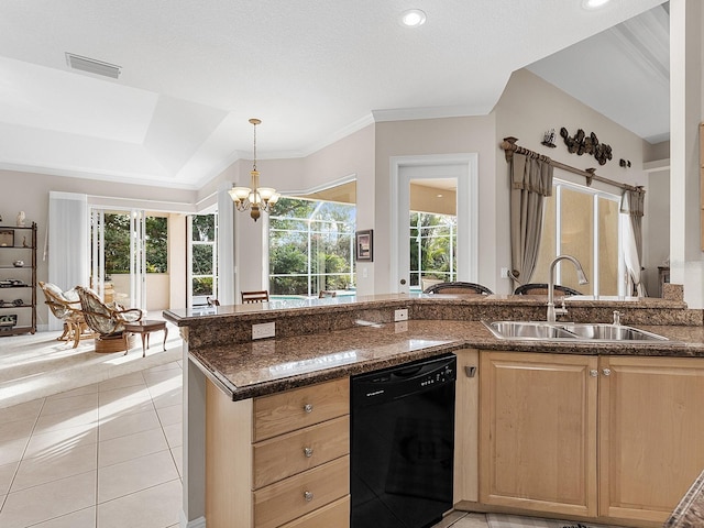 kitchen featuring sink, light tile patterned floors, dark stone countertops, an inviting chandelier, and black dishwasher