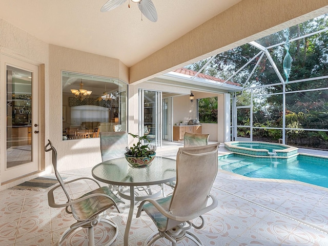 view of pool featuring a lanai, exterior kitchen, a patio, and an in ground hot tub