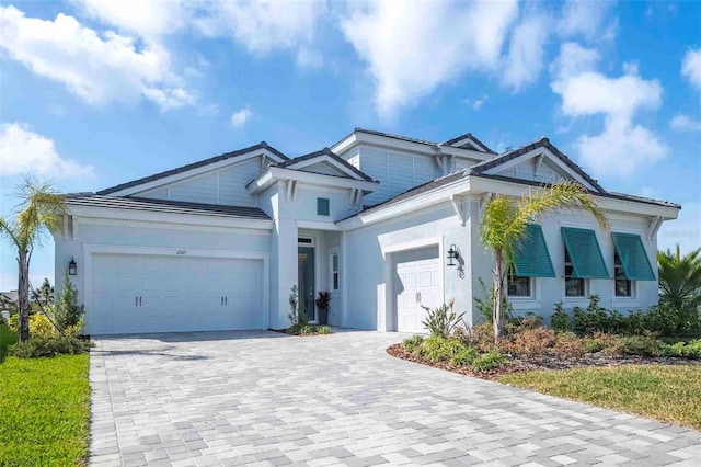 view of front of property featuring a garage