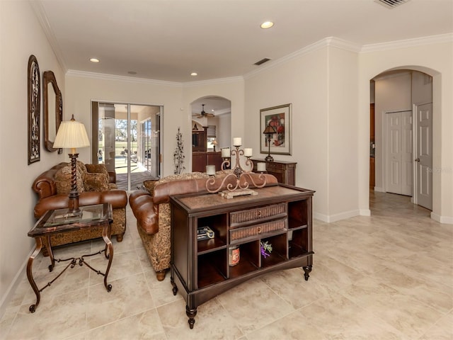 living room featuring crown molding