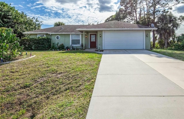 ranch-style house with a garage and a front lawn