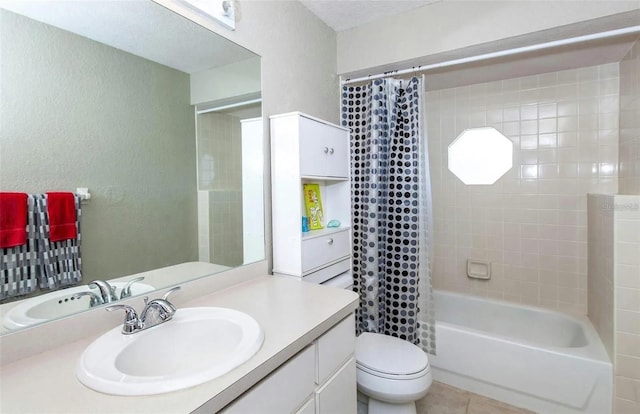 full bathroom featuring tile patterned flooring, vanity, shower / bathtub combination with curtain, and toilet