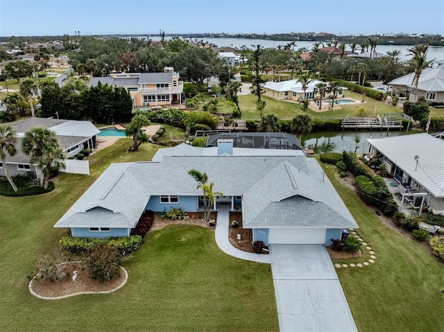 drone / aerial view featuring a water view