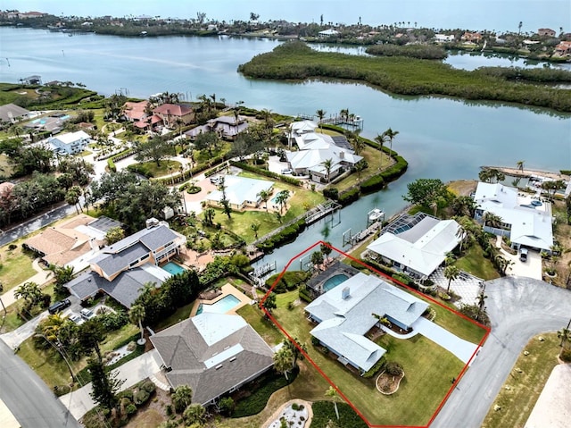 bird's eye view with a water view