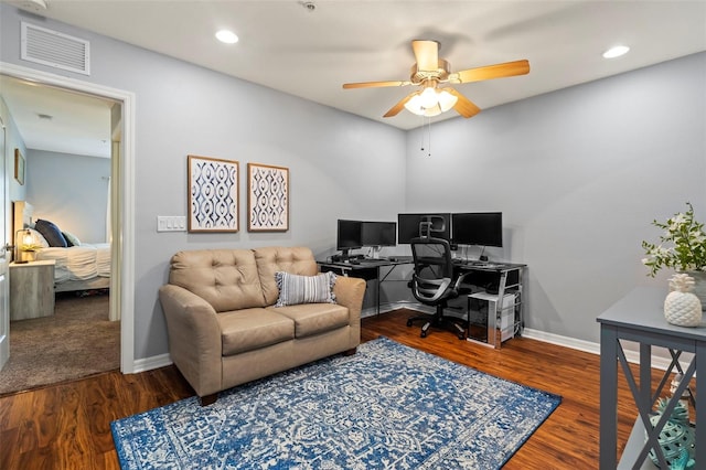 home office with hardwood / wood-style flooring and ceiling fan