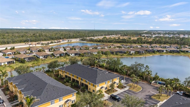 drone / aerial view featuring a water view