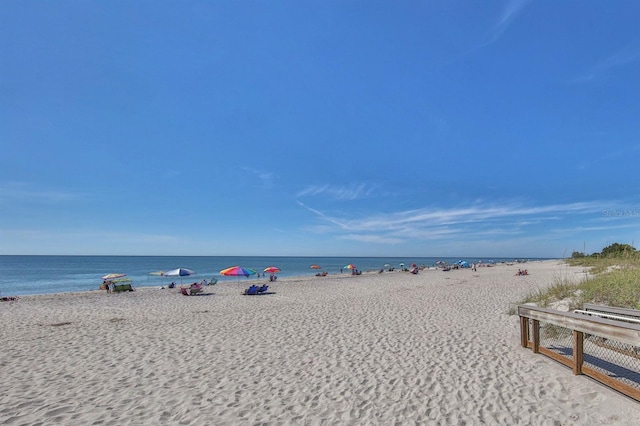 view of water feature with a beach view