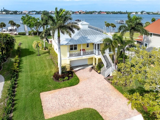 bird's eye view with a water view