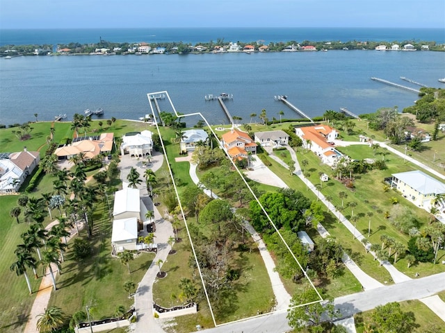 bird's eye view with a water view