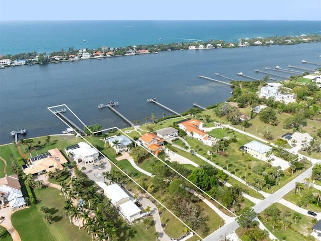 birds eye view of property featuring a water view