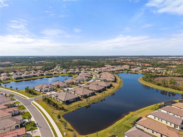 drone / aerial view with a water view