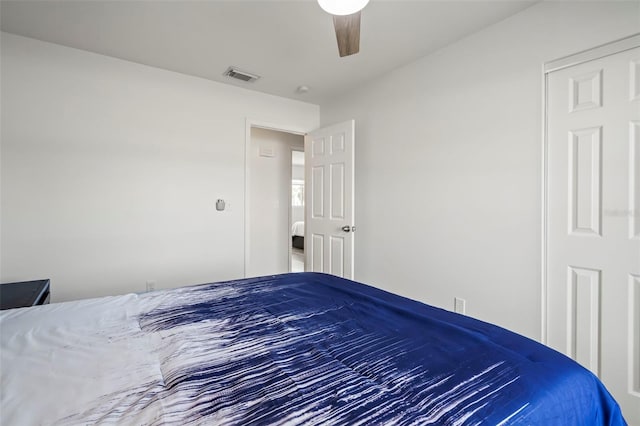 unfurnished bedroom featuring ceiling fan