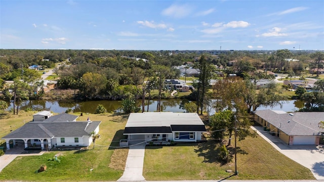 drone / aerial view with a water view