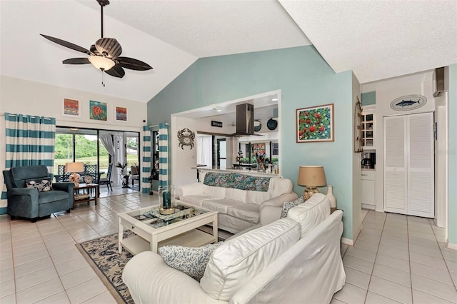 tiled living room with high vaulted ceiling and ceiling fan