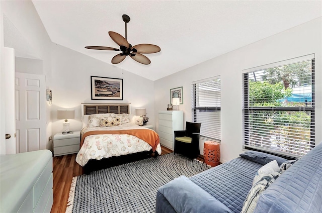 bedroom featuring lofted ceiling, hardwood / wood-style floors, and ceiling fan