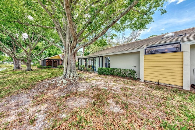 exterior space featuring a lawn