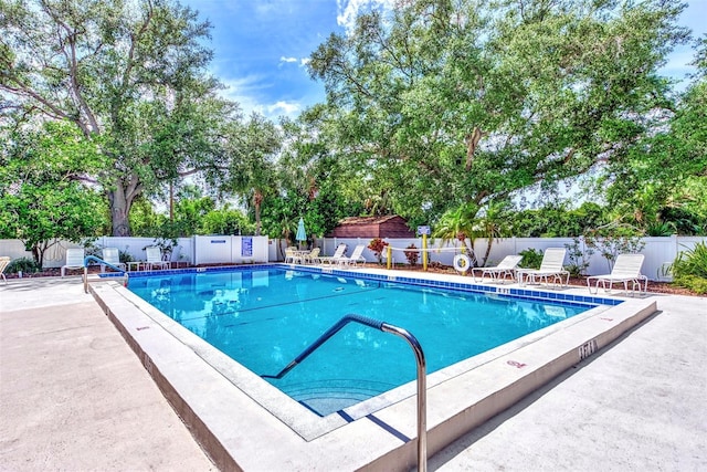 view of pool featuring a patio area