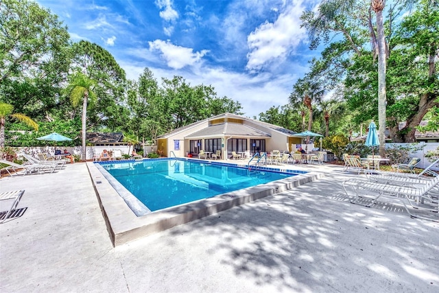 view of pool with a patio area