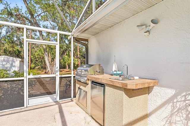 sunroom featuring sink