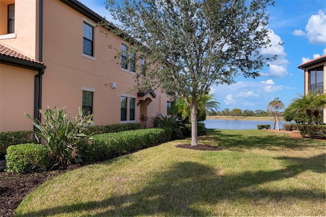 view of yard with a water view