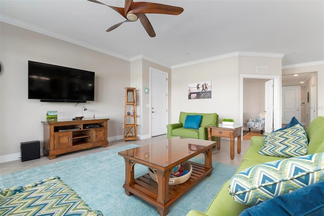 living room featuring light tile patterned floors, ornamental molding, and ceiling fan