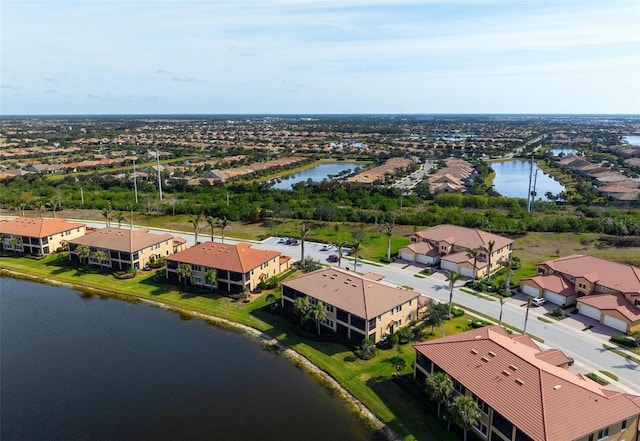 drone / aerial view featuring a water view