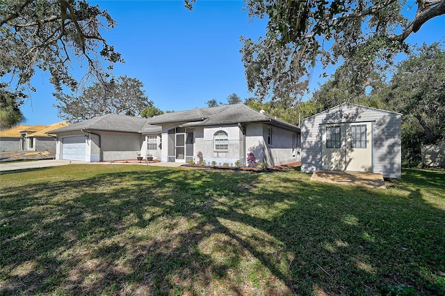 ranch-style house featuring a garage and a front yard