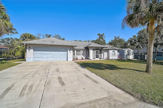 ranch-style home featuring a garage and a front lawn