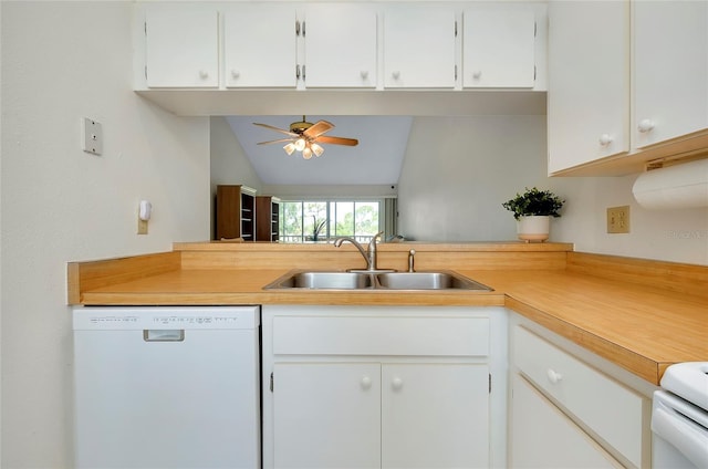 kitchen featuring sink, ceiling fan, stove, white dishwasher, and white cabinets