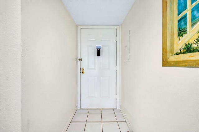 entryway featuring light tile patterned flooring