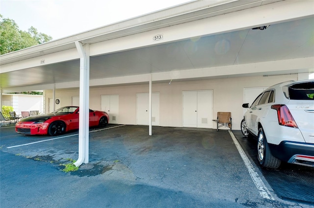 view of car parking with a carport