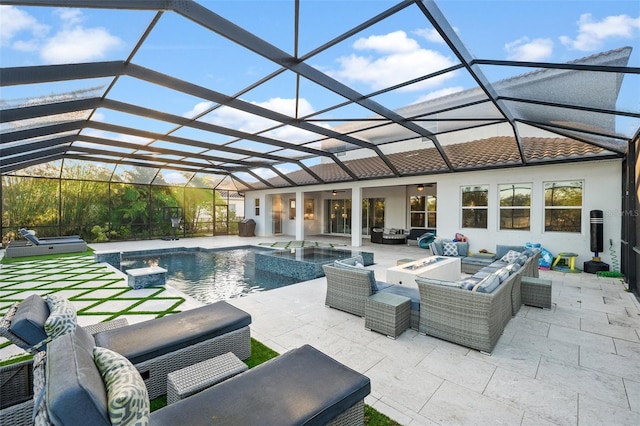 view of swimming pool featuring a patio area, an outdoor living space with a fire pit, and an in ground hot tub