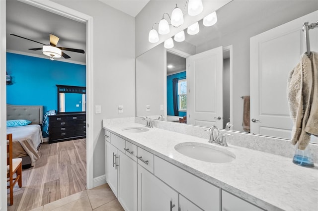 bathroom featuring vanity, tile patterned floors, and ceiling fan