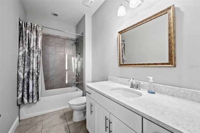 full bathroom featuring shower / tub combo, tile patterned flooring, vanity, a textured ceiling, and toilet