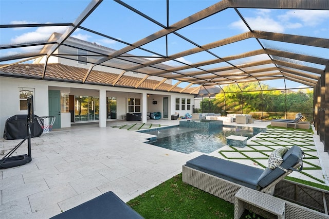 view of swimming pool with a lanai and a patio