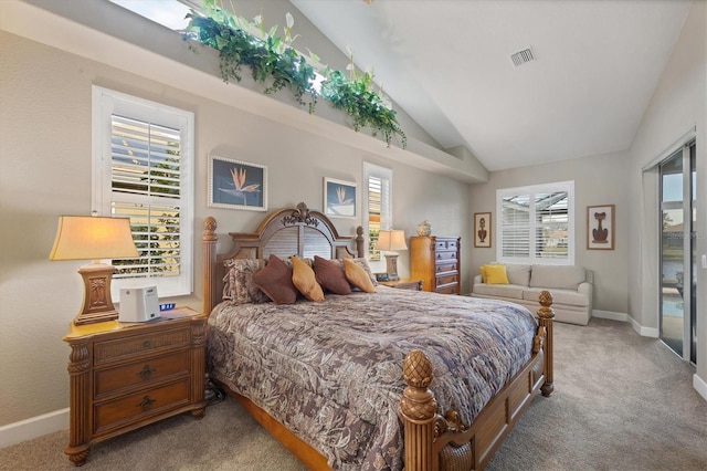 bedroom with access to exterior, vaulted ceiling, and light carpet